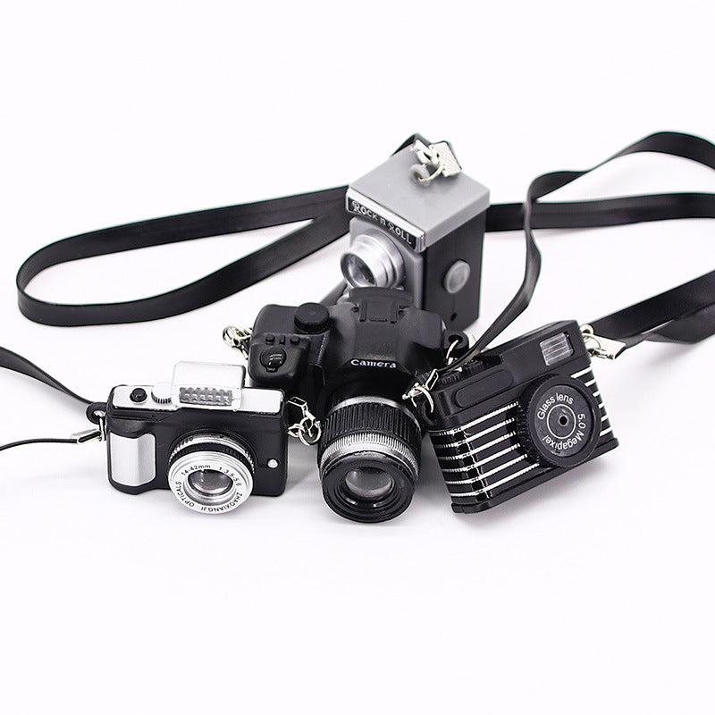 MiniSnap Clip – Shrinking Toy Strap Camera Accessory