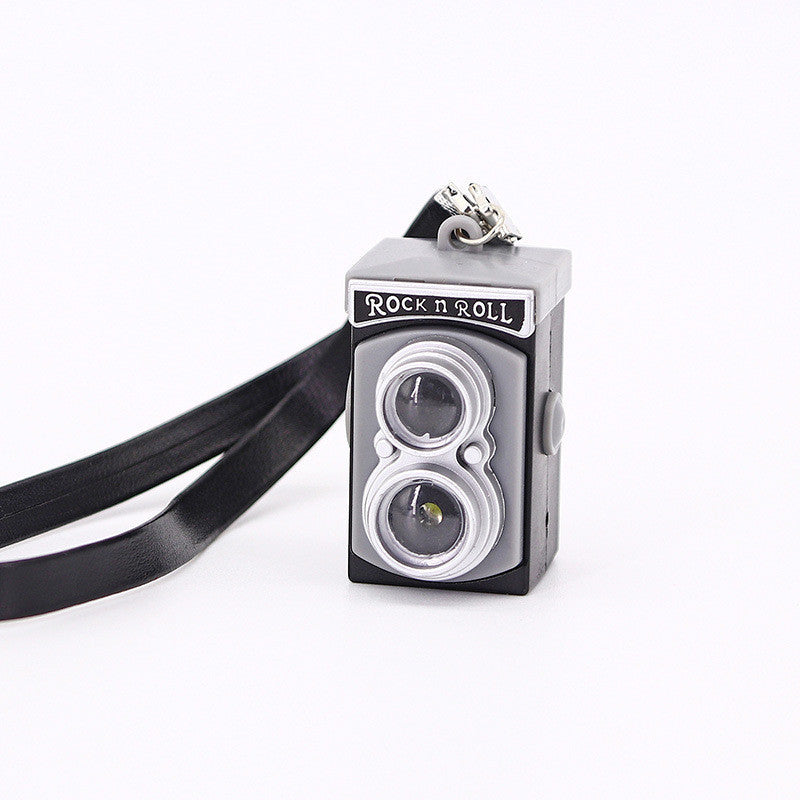 MiniSnap Clip – Shrinking Toy Strap Camera Accessory