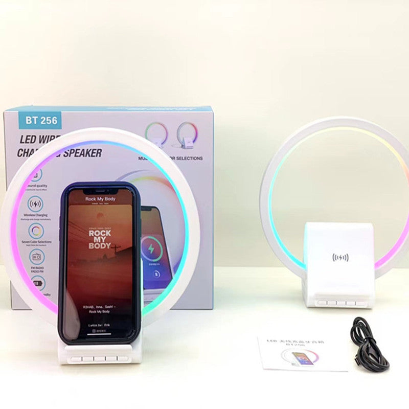 AuraWave™ — Smart Bluetooth Speaker with Ambience Light & 15W Wireless Charger