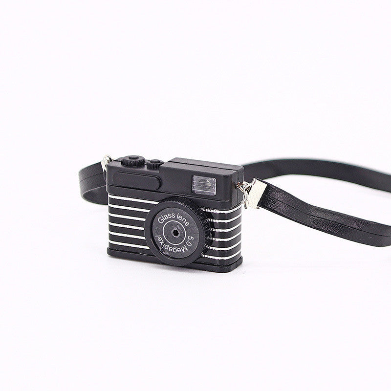 MiniSnap Clip – Shrinking Toy Strap Camera Accessory