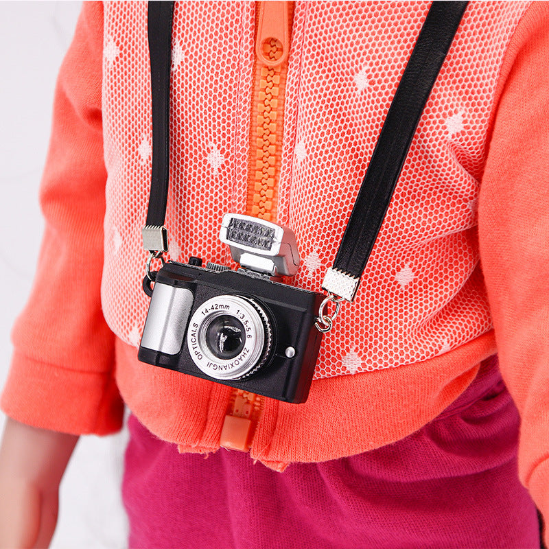 MiniSnap Clip – Shrinking Toy Strap Camera Accessory